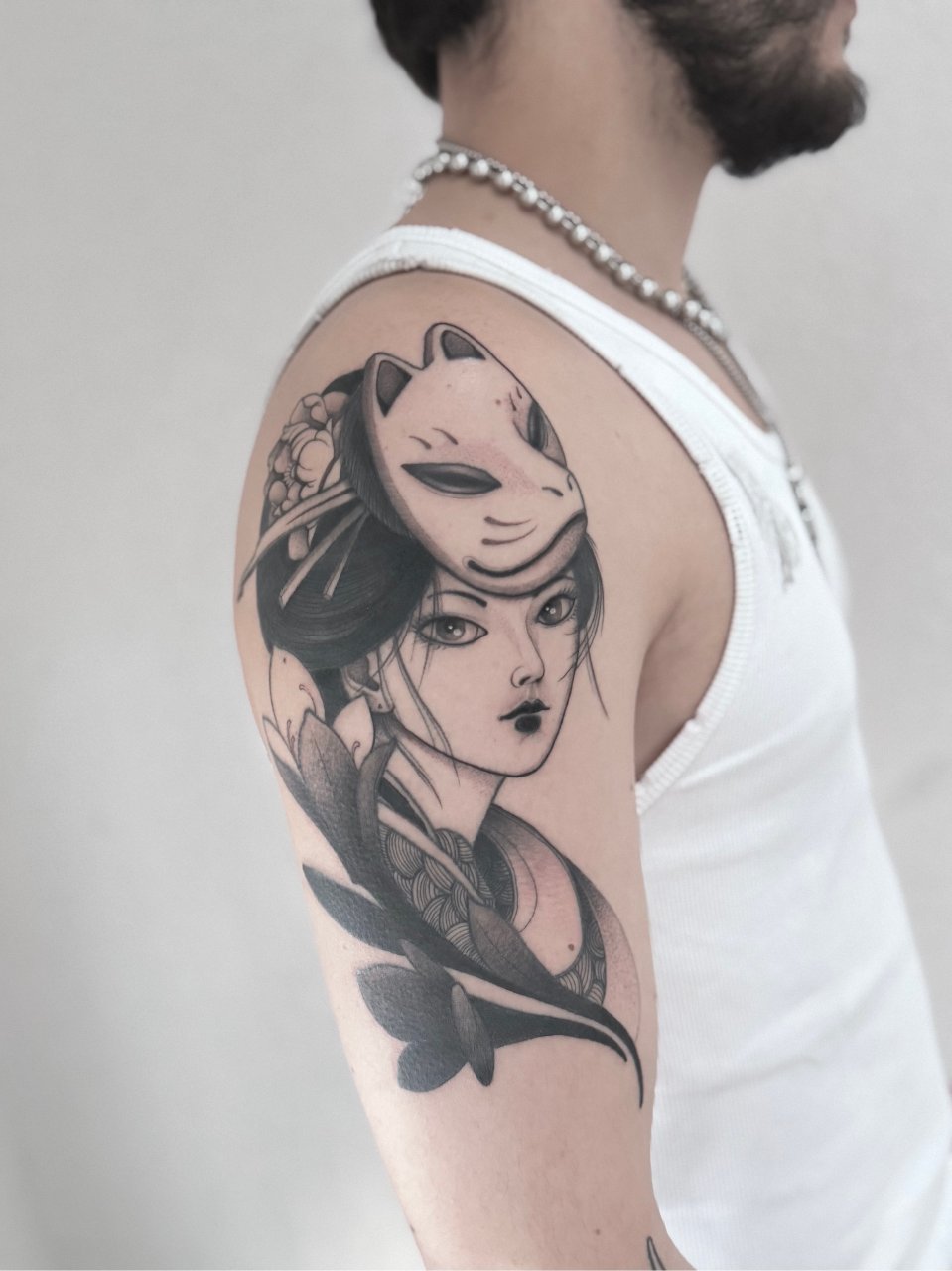 Geisha whit a kitsune mask