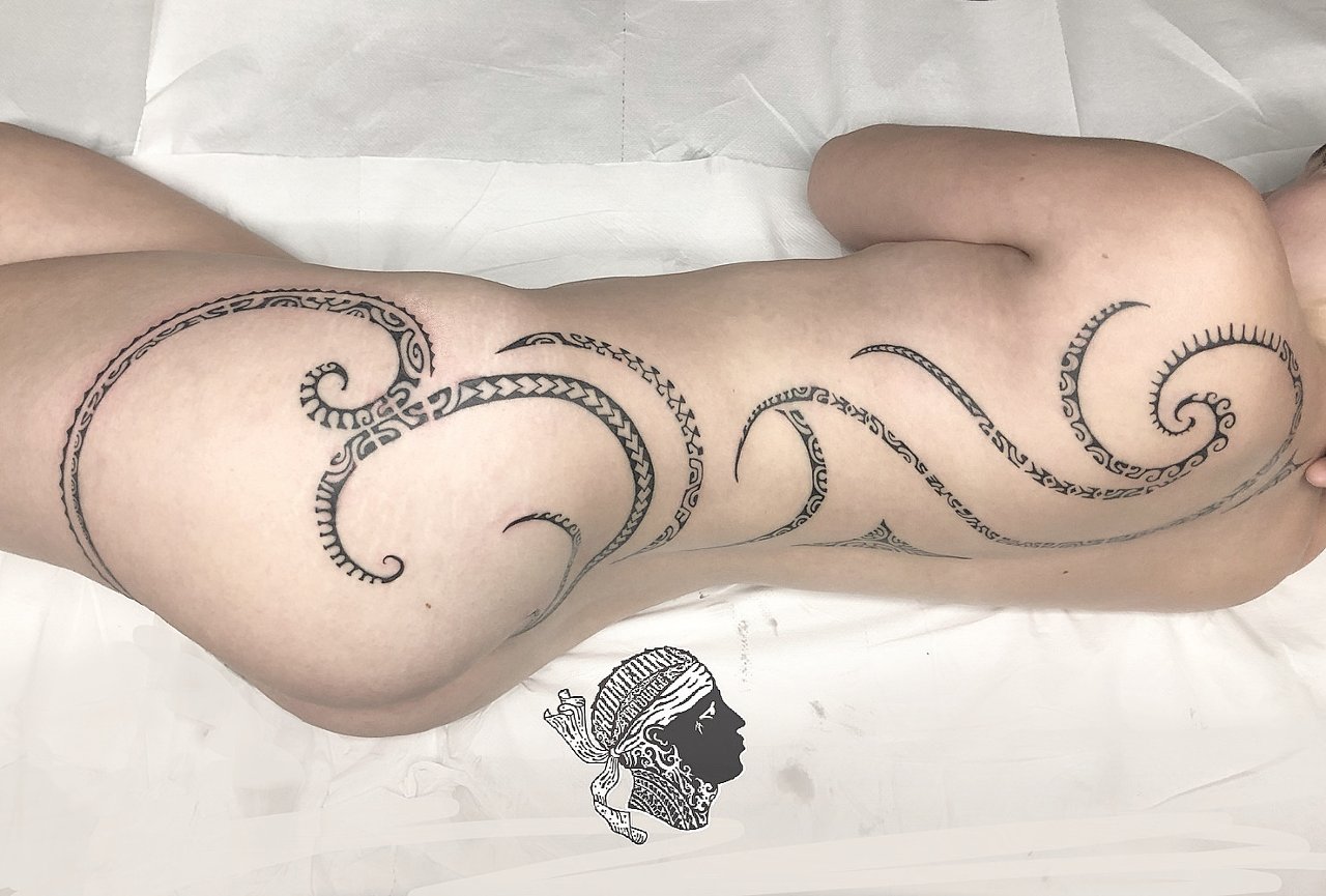 Feminine Polynesian tattoo